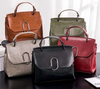 天津?yàn)I海新區(qū)進(jìn)口韓國牛皮手提包報(bào)關(guān)流程代理案例